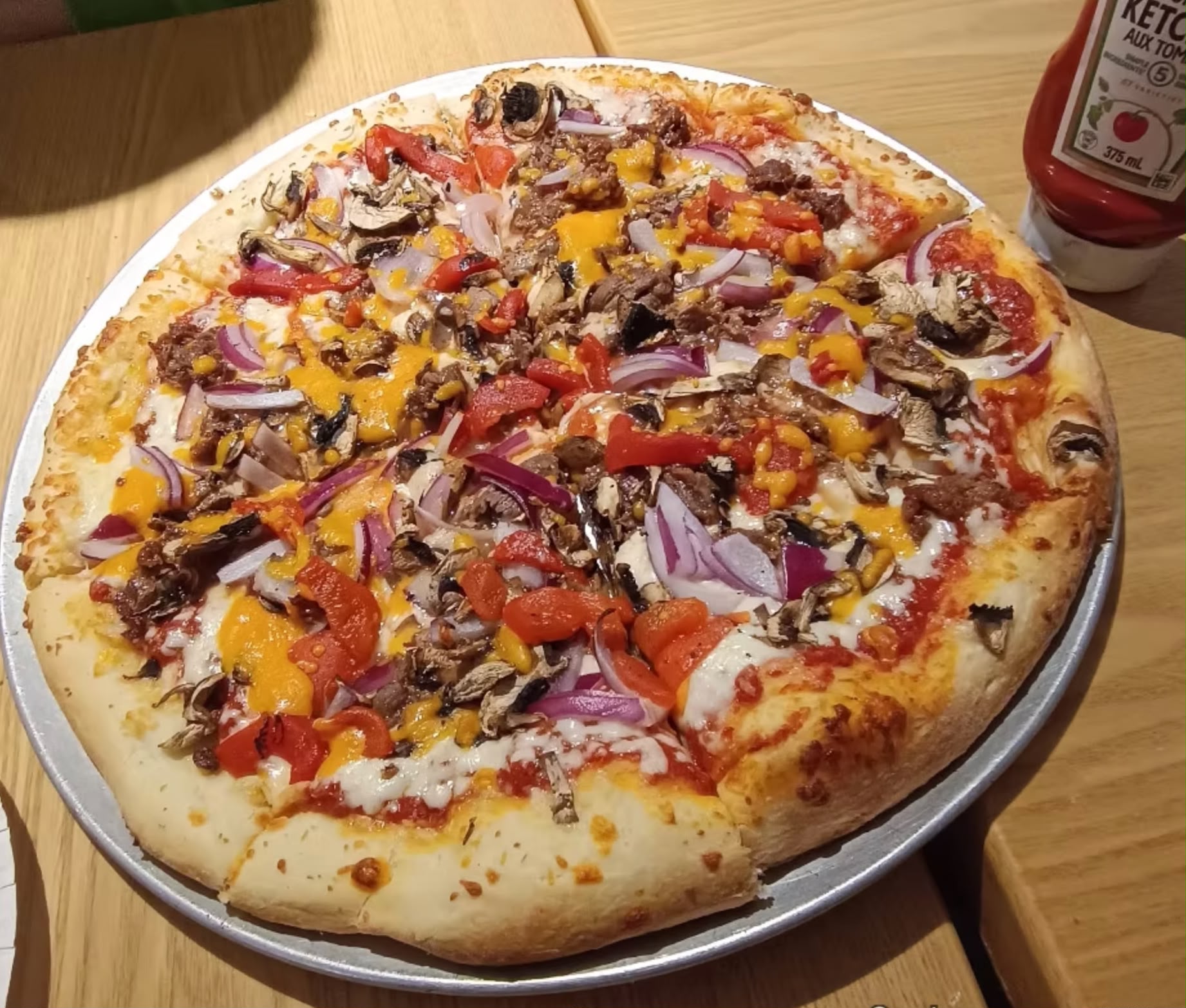 18 inch jumbo party pizza with fresh basil and melted mozzarella